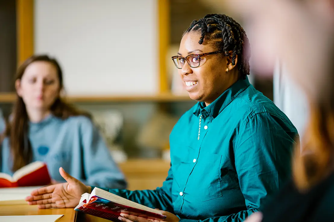 Shaneda Destine, Assistant Professor in the Department of Sociology, holds class in the Special Collections section of John C. Hodges Library on March 14, 2019.