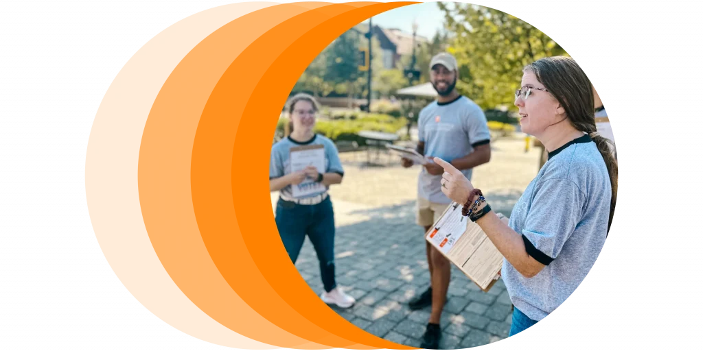 Megan Conley speaks to students in the Justice Studies Graduate Certificate program, outside on UT's campus.